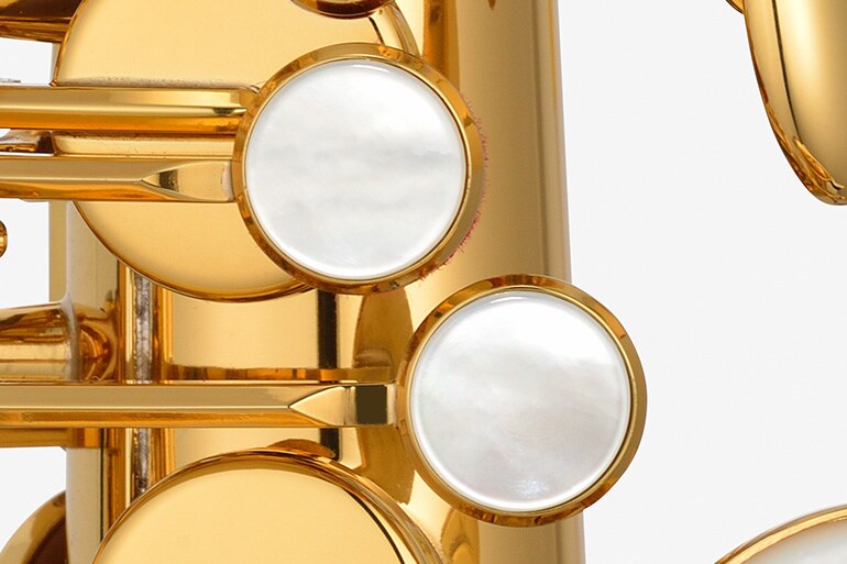 Perleťová tlačítka klapek