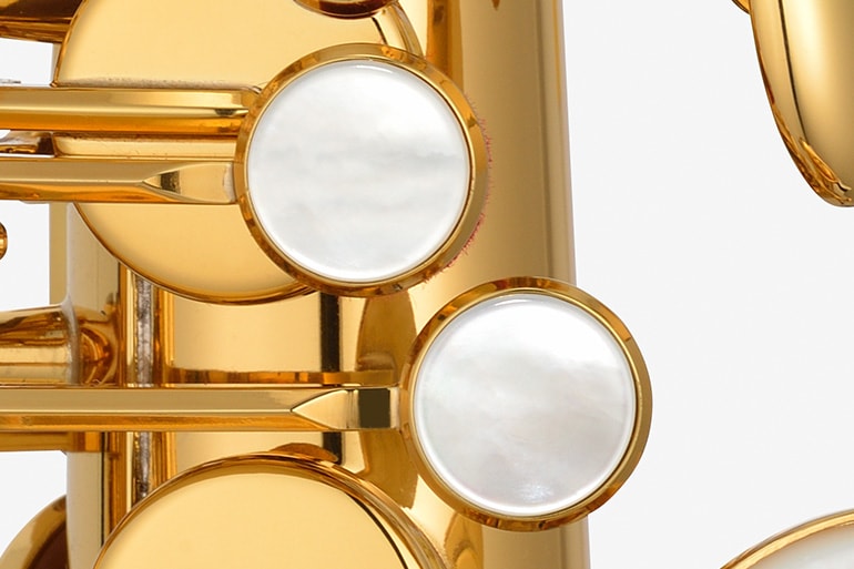 Perleťová tlačítka klapek