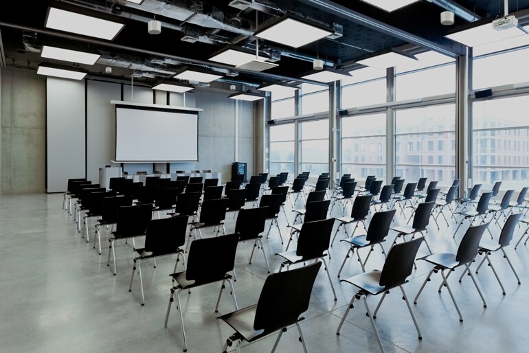 Multi-purpose room with VXC2P pendant-mounted speakers