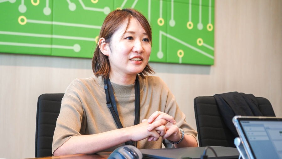 Ms. Toyoshima speaking during an interview